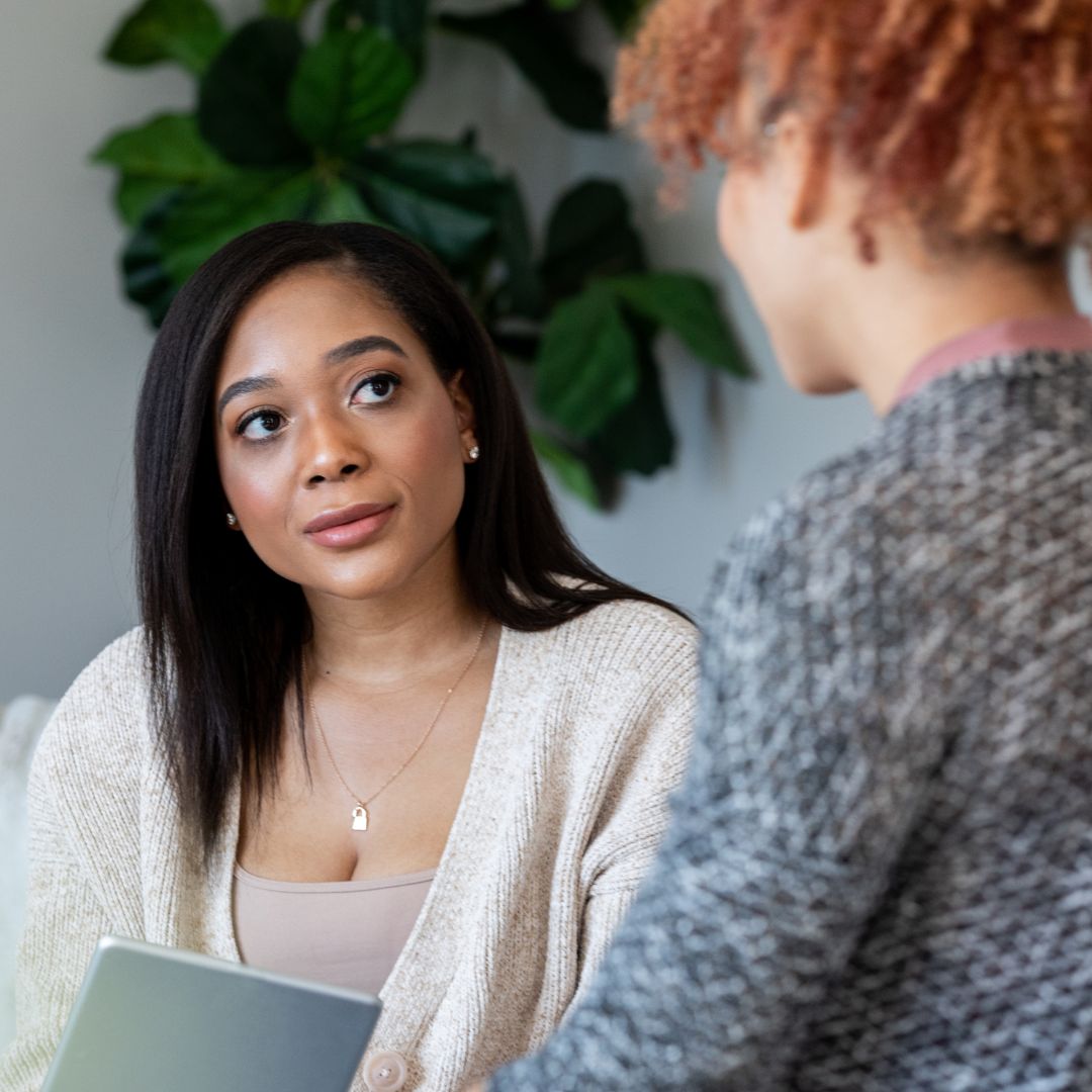 Therapist noting patient speech during personal session Top 7